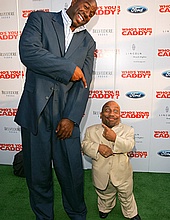 Magic Johnson & Kevin Cox at the â€œWhoâ€™s Your Caddy?â€ premiere