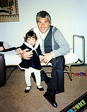 Amy Winehouse with her dad on her 1st birthday
